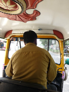 Our tuk tuk driver before he picked up his friend that wanted to sell us tours.....