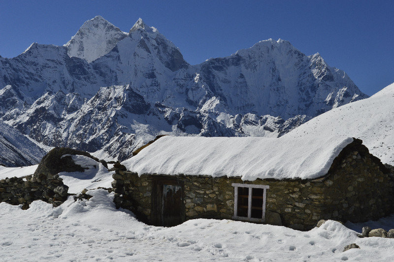 Snow covered hut