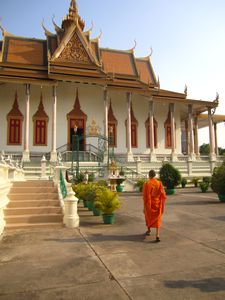 Monk in front of the silver pagoda