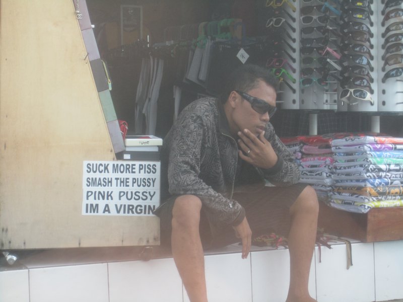 Sums up the type of shops in Kuta. Surf board stickers?