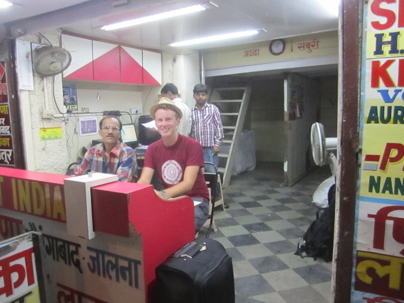 Me at the Aurangabad bus stop tour agent, hard at work!