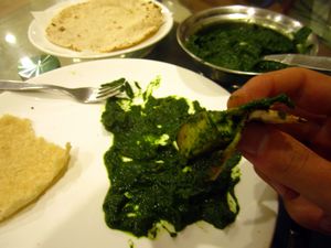Palak Paneer in India. Hit-and-miss.. more miss than hit.