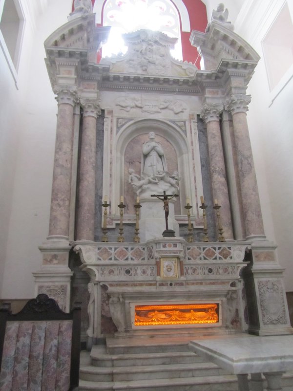 The bones of St Pedro Claver under the alter
