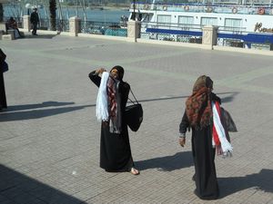 Ladies selling scarves