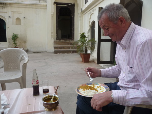 Chris eating Dal in Alipura Palace