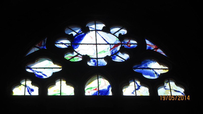 The modern stain glass windows at Brioude Basilica
