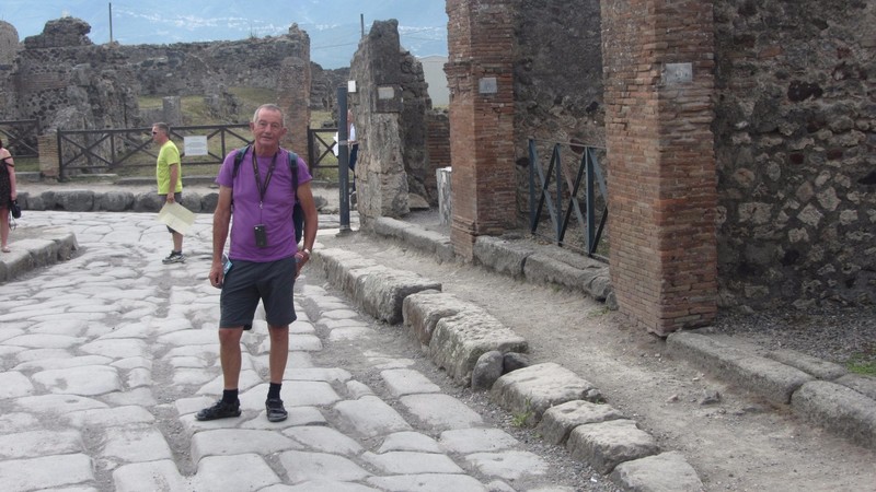 Chris at Pompeii - not the chariot wheel ruts!