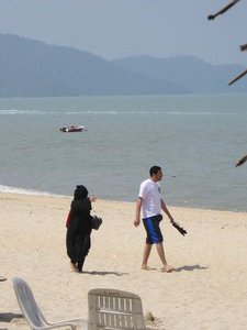 The Black Burka Beach goer. She actually went in the water after. 