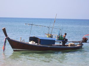 These boats are used to transport people and for squid fishing at night