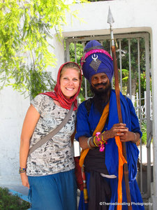 posing with a guard at the Golden Temple