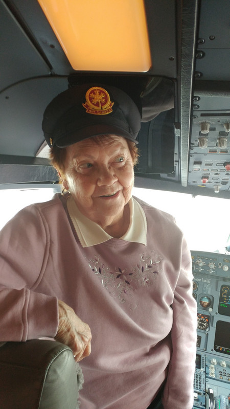 Joanie wearing the pilot's hat
