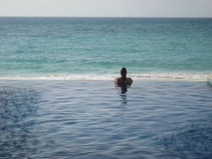 Sal in pool overlooking ocean