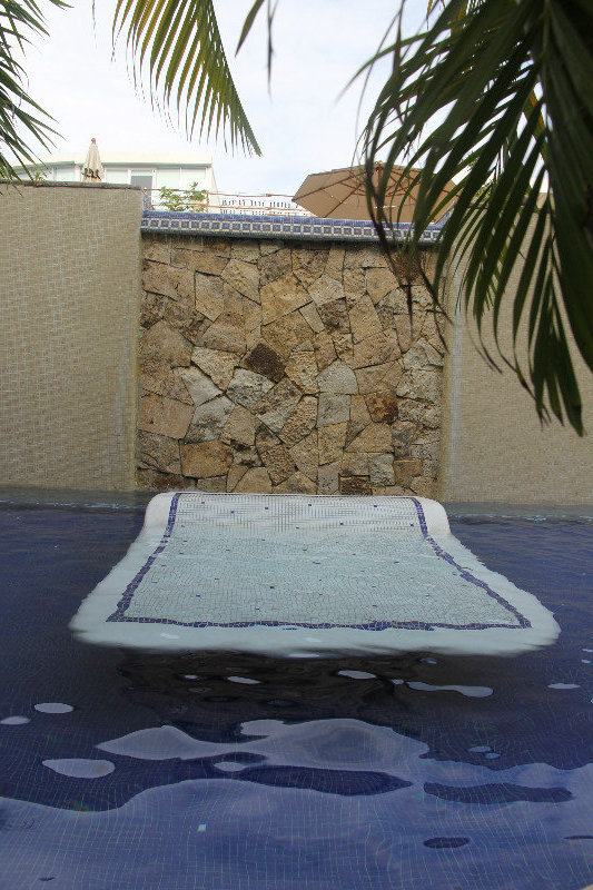 Day bed in pool