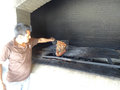 Grilling fish over coals (HOT)