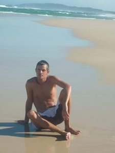 me sitting on Tallow Beach Byron Bay