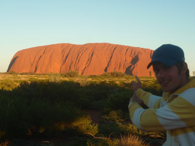 me pointing at Uluru