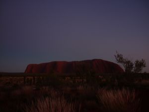 dark blue sky sunrise Uluru