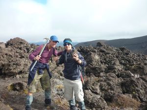 me with ice-axe and John (Eng) with a rock at Tongariro Crossing