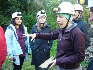 our guide explaining at Waitomo Caves
