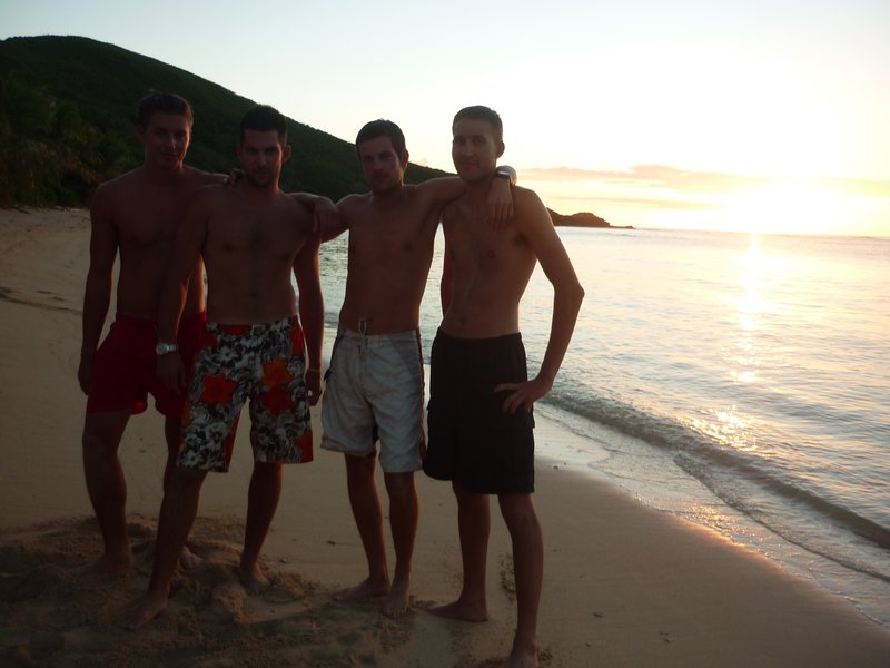 Christian, Alex (Ger), me and Scott (USA) at sunset on Honeymoon Beach Naviti