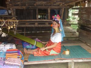 long neck lady working hill tribe village Chiang Mai