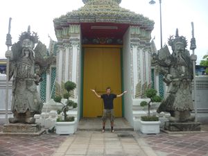 me in between two statues Wat Pho Bangkok