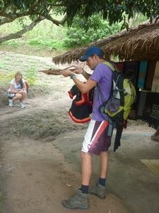 me shooting a cross bow at hill tribe village Chiang Mai