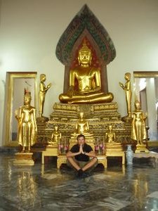 me sitting in front of big buddha Wat Pho Bangkok