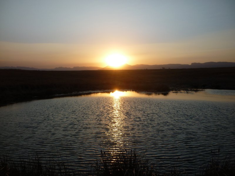 a lake and the sun Northern Drakensberg
