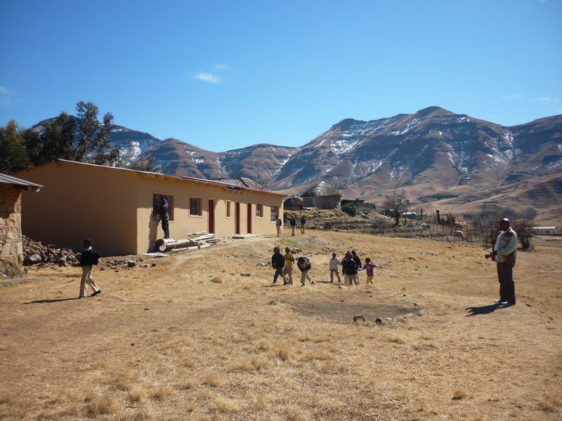 children in front of a school Lesotho
