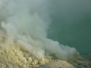 smoke and crater lake Kawah Ijen