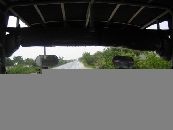 View from rainy rear mirror