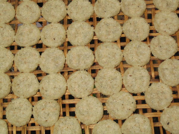 Sticky rice cakes drying in the sun