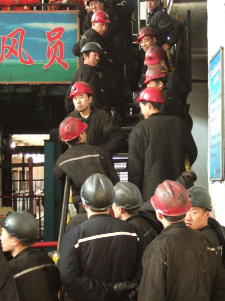Miners entering the shaft.