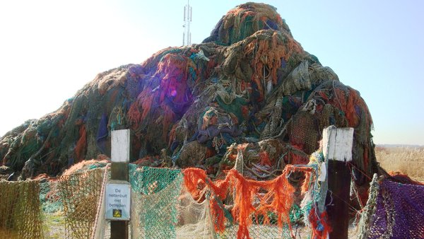 The heap of fishing nets stacked outside