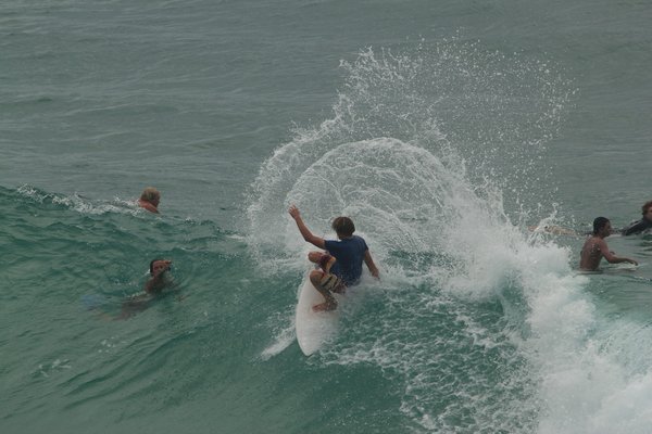 Surfers at the pass
