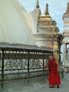 Monk on his way around the stupa