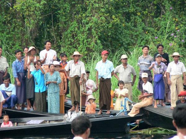 Burmese were encouraging the racing boats