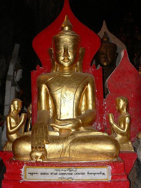 Buddha statue with a name plate