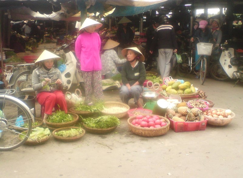 Conical Hat-wearing Ladies at Hoi An market