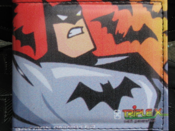 my new Batman wallet, of which the compartments are too small to actually fit anything into.