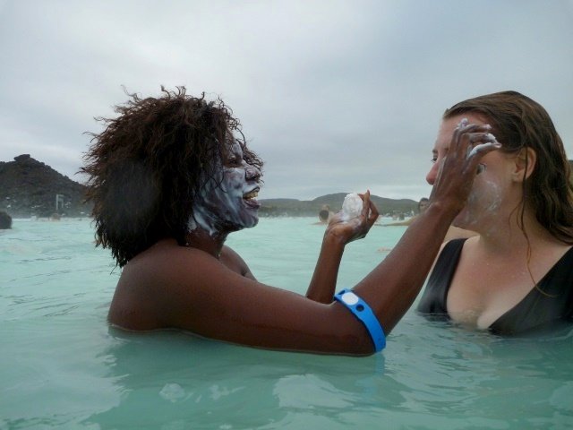 Putting white mad on our faces, with my girlfriend Amber