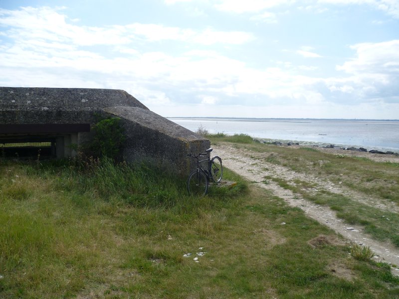 Dilapidated gun emplacement and similar bike