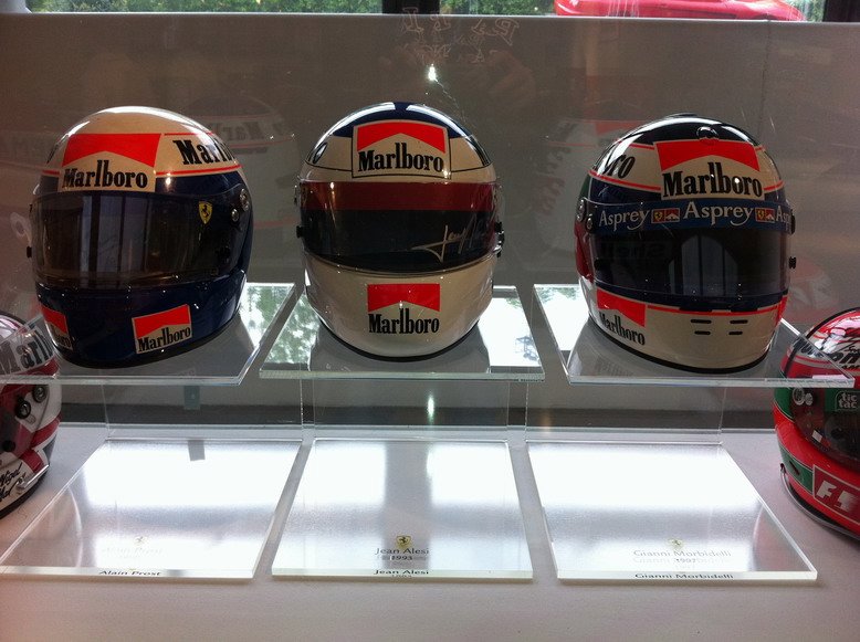 Helmets left to right; Alain Prost 1990, Jean Alesi 1993 & Gianna Morbidelli 1997
