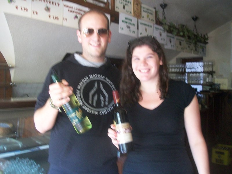 Florian and me with bottles of their wine