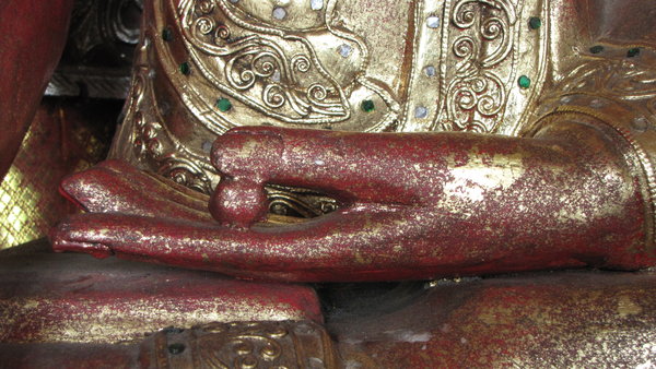 close up of the hand of Buddha