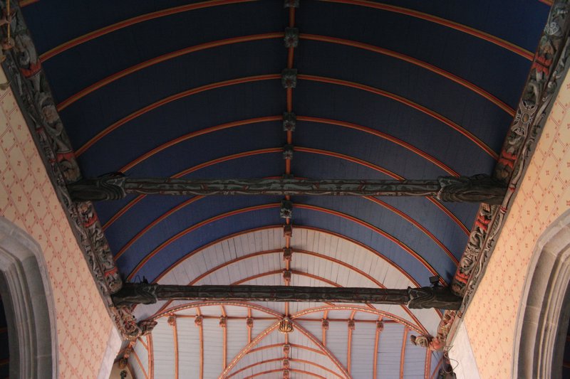 Carved beams and vaulted ceiling in “Église Saint-Suliau”