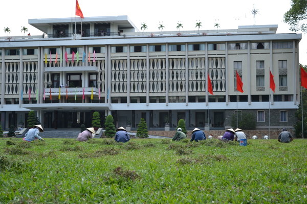 Worker's at the Palace "mowing" the lawn