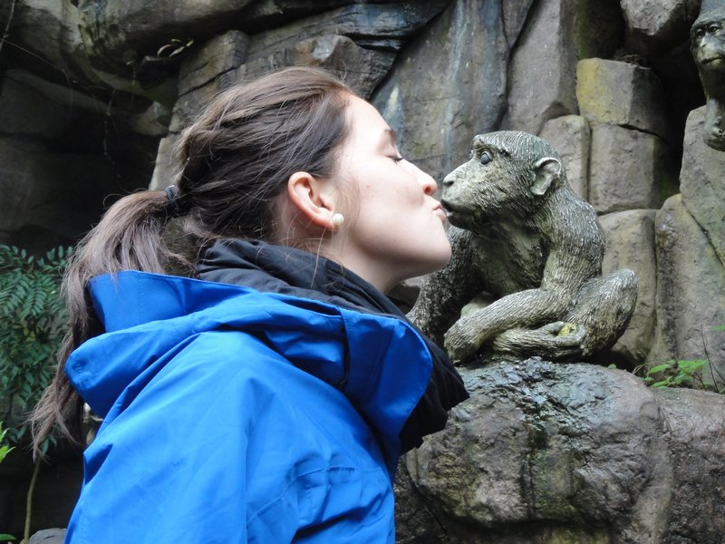 Julie kissing a monkey