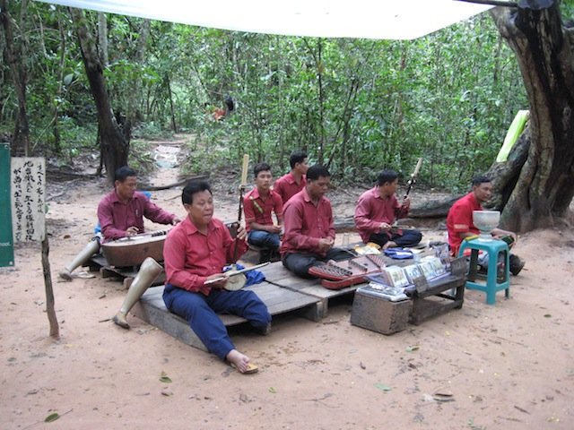 landmine victims playing beautiful music in the jungle